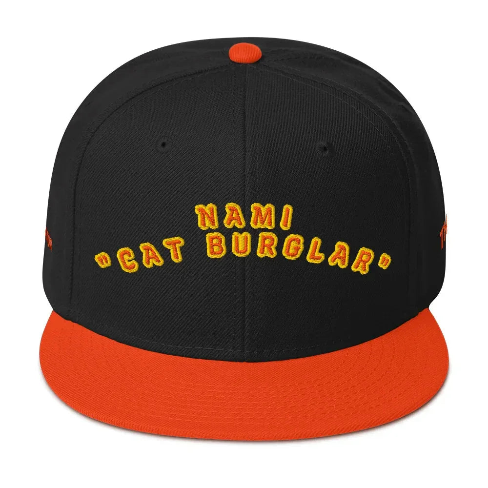 Black and orange snapback hat featuring Nami from one piece female characters with Cat Burglar text
