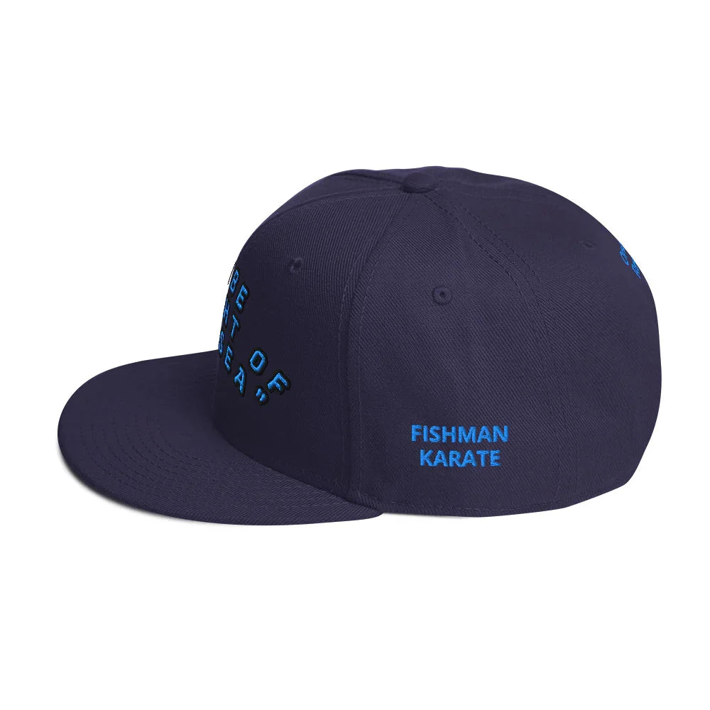 One Piece Jinbe snapback navy blue cap with Fishman Karate embroidery on the side