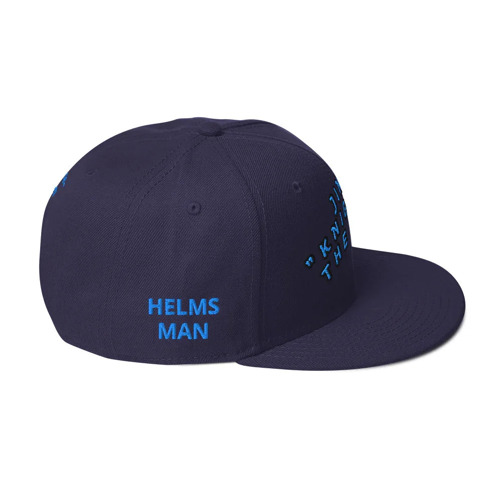 Navy blue One Piece Jinbe snapback cap with blue embroidered text Helms Man on the side